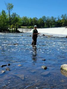 Sandra LaVigne collecting WQ Samples at Dundee Dam